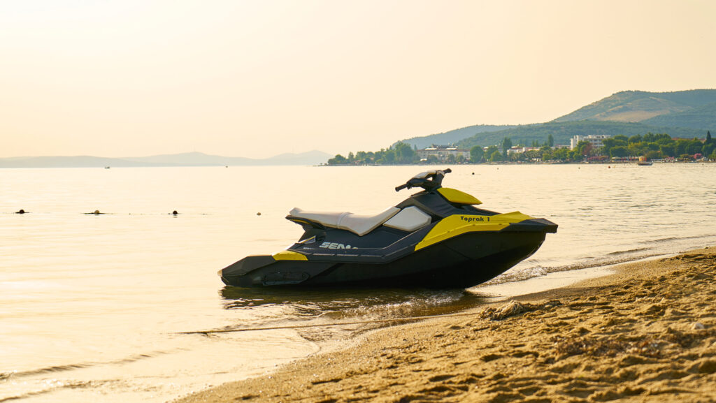Jet Ski - A high-speed water ride splashing through waves with thrill and excitement.